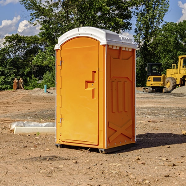 how often are the portable restrooms cleaned and serviced during a rental period in Montezuma